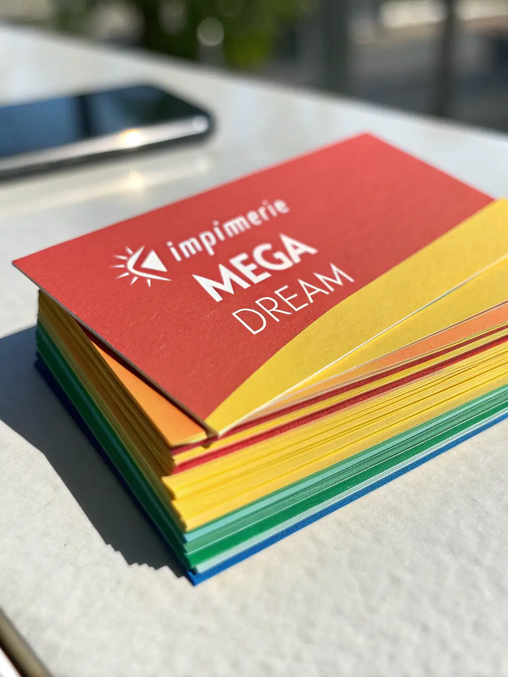A close-up shot of a business card being printed with vibrant colors and sharp details, showcasing the high-quality printing capabilities of Summit Business Cards.